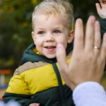 young-man-boy-with-raised-palms